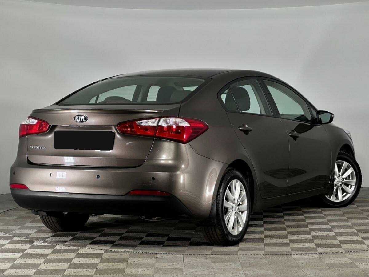 Kia Cerato с пробегом — 2014 год. Фото: #1