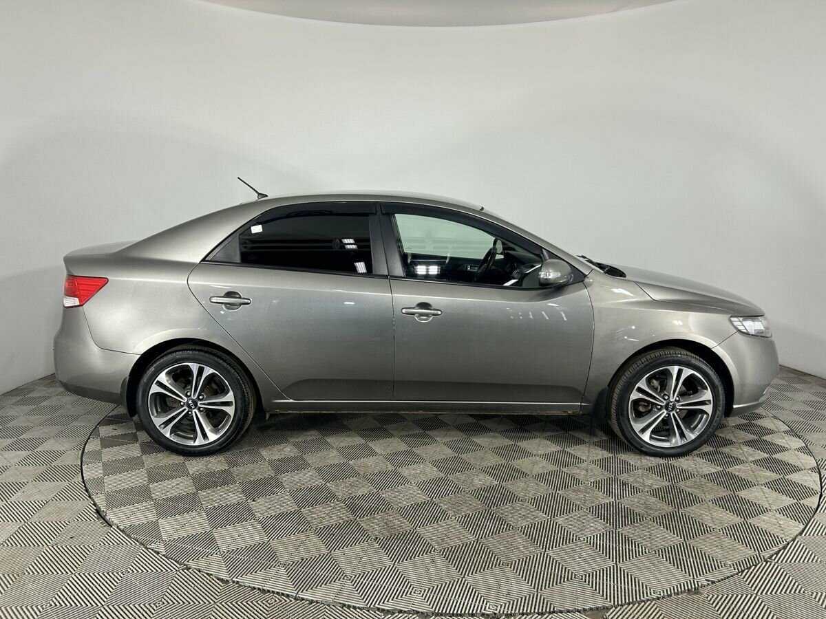 Kia Cerato с пробегом — 2010 год. Фото: #2