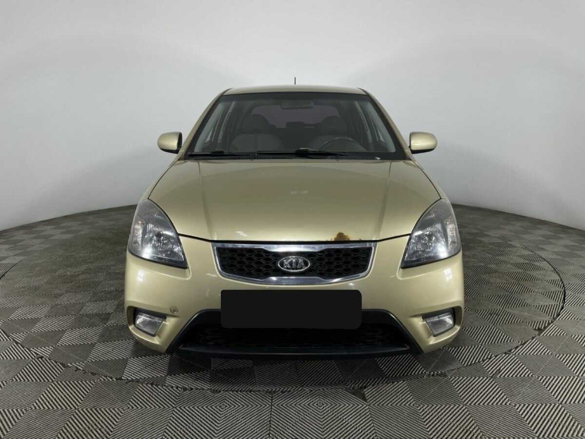 Kia Rio с пробегом — 2010 год. Фото: #1