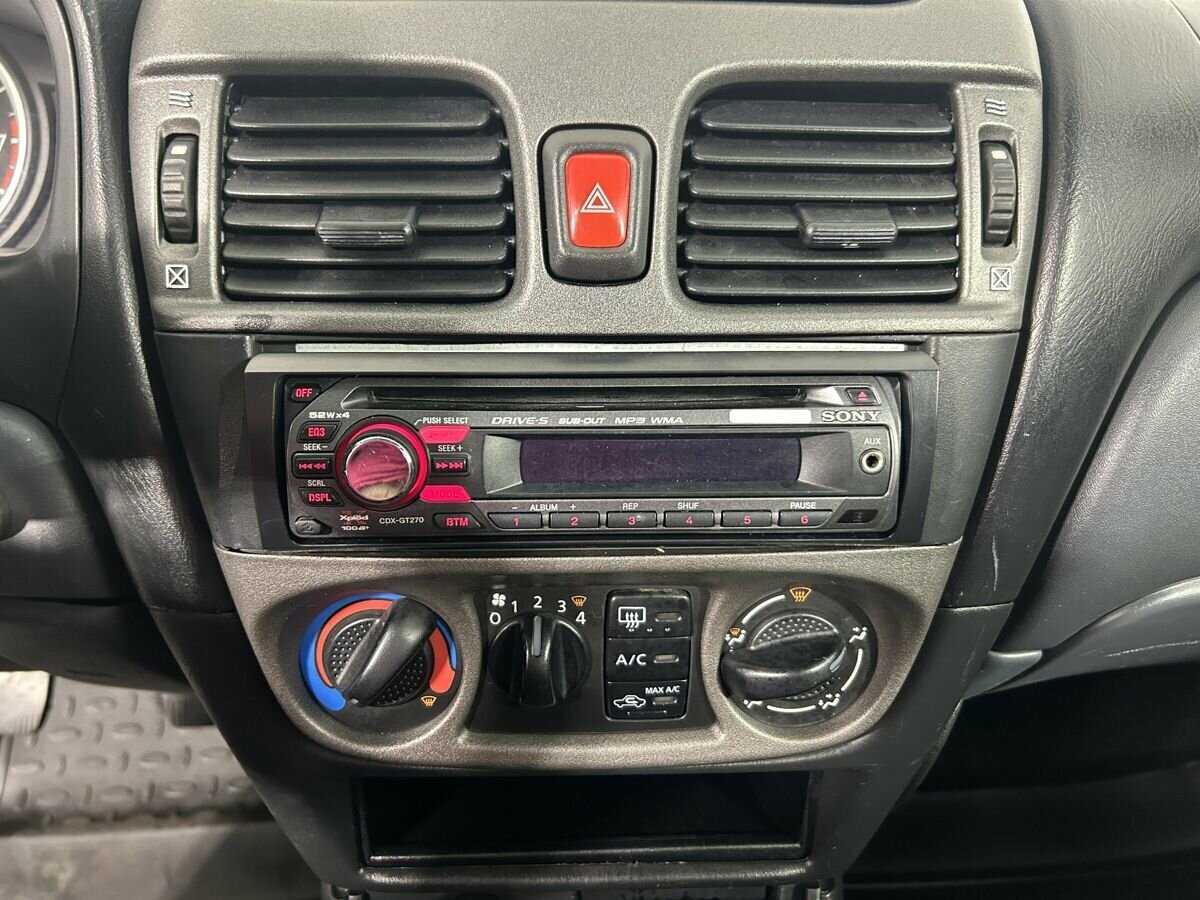 Nissan Almera с пробегом — 2005 год. Фото: #11