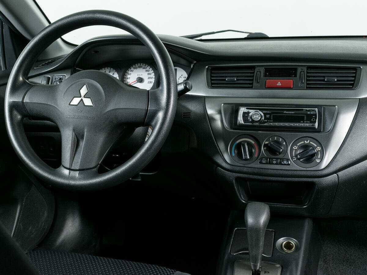 Mitsubishi Lancer с пробегом — 2006 год. Фото: #10