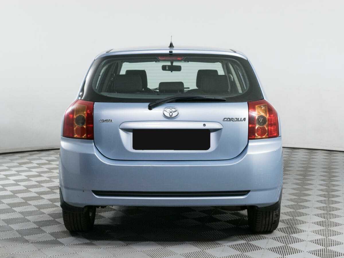 Toyota Corolla с пробегом — 2004 год. Фото: #4