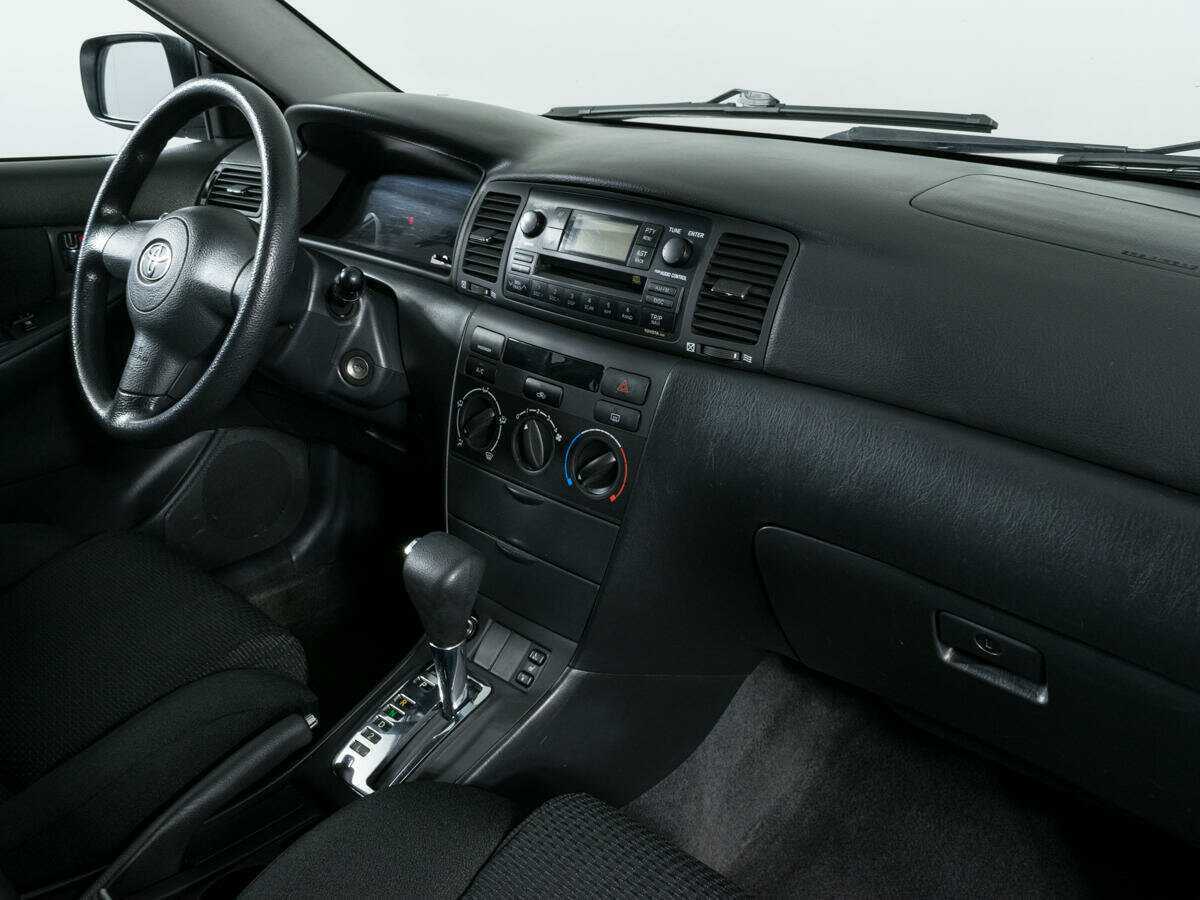 Toyota Corolla с пробегом — 2004 год. Фото: #6