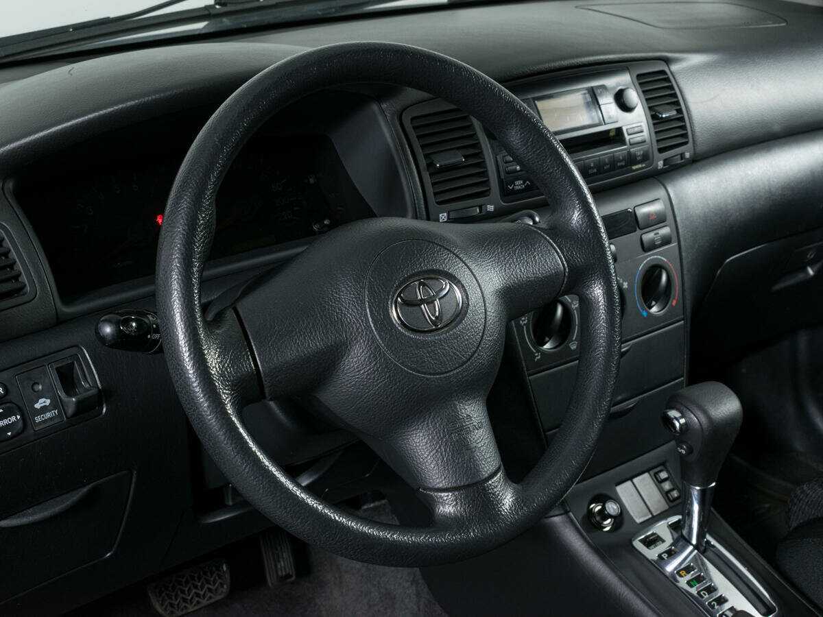 Toyota Corolla с пробегом — 2004 год. Фото: #11