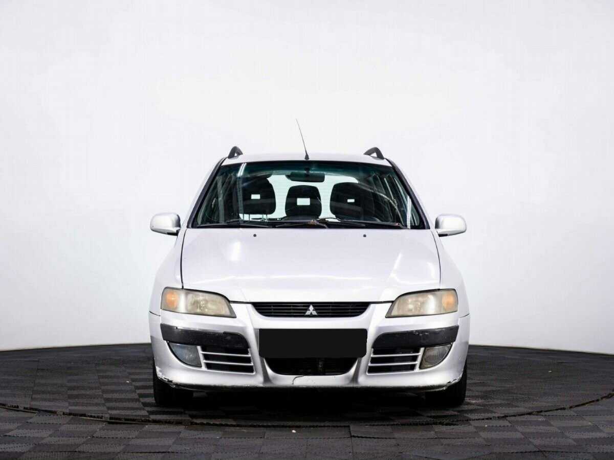 Mitsubishi Space Star с пробегом — 2002 год. Фото: #1