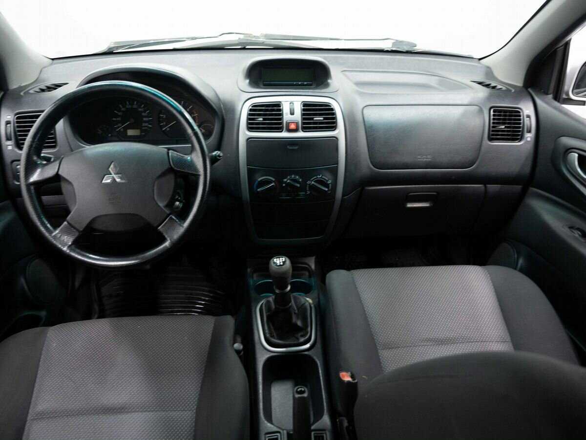 Mitsubishi Space Star с пробегом — 2002 год. Фото: #11