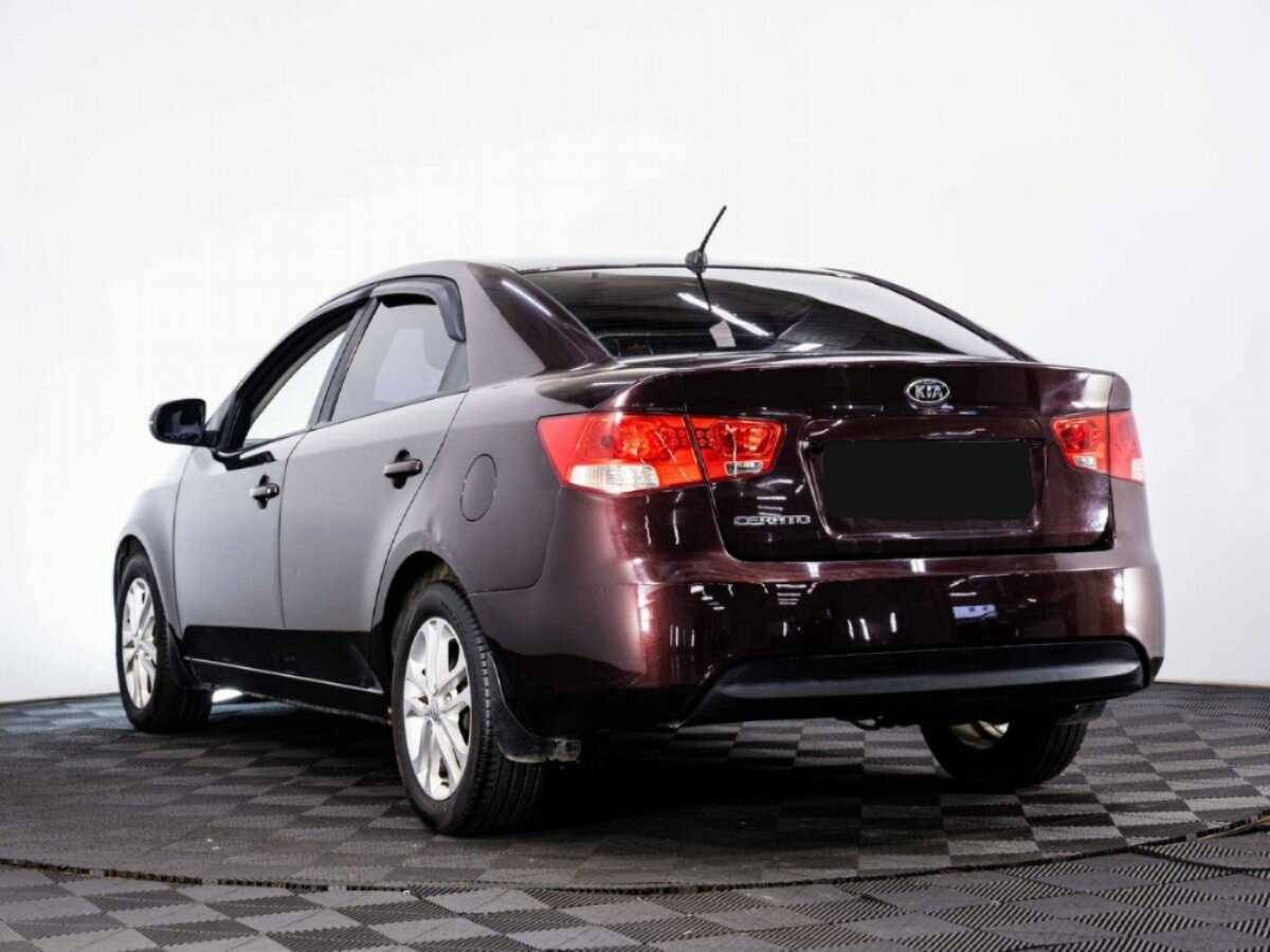 Kia Cerato с пробегом — 2011 год. Фото: #3