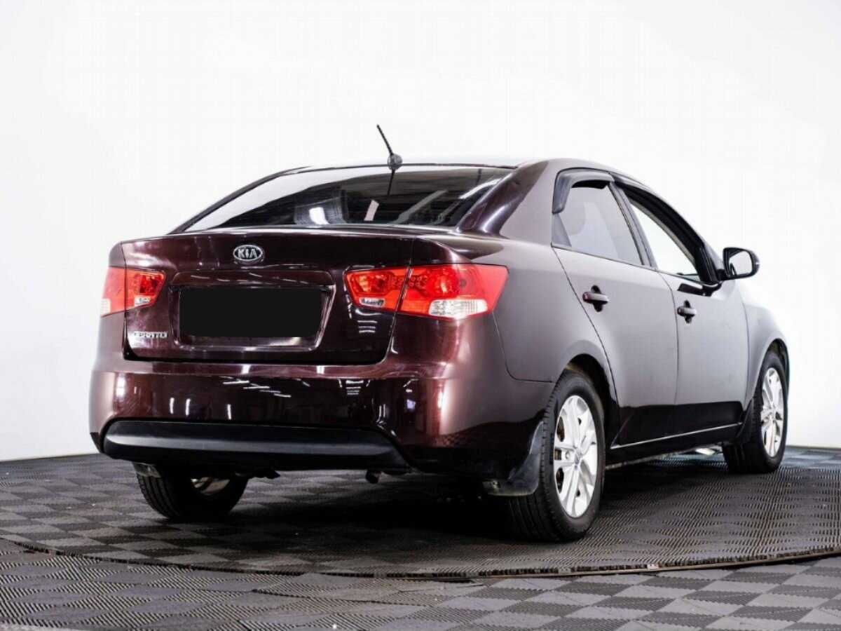 Kia Cerato с пробегом — 2011 год. Фото: #5