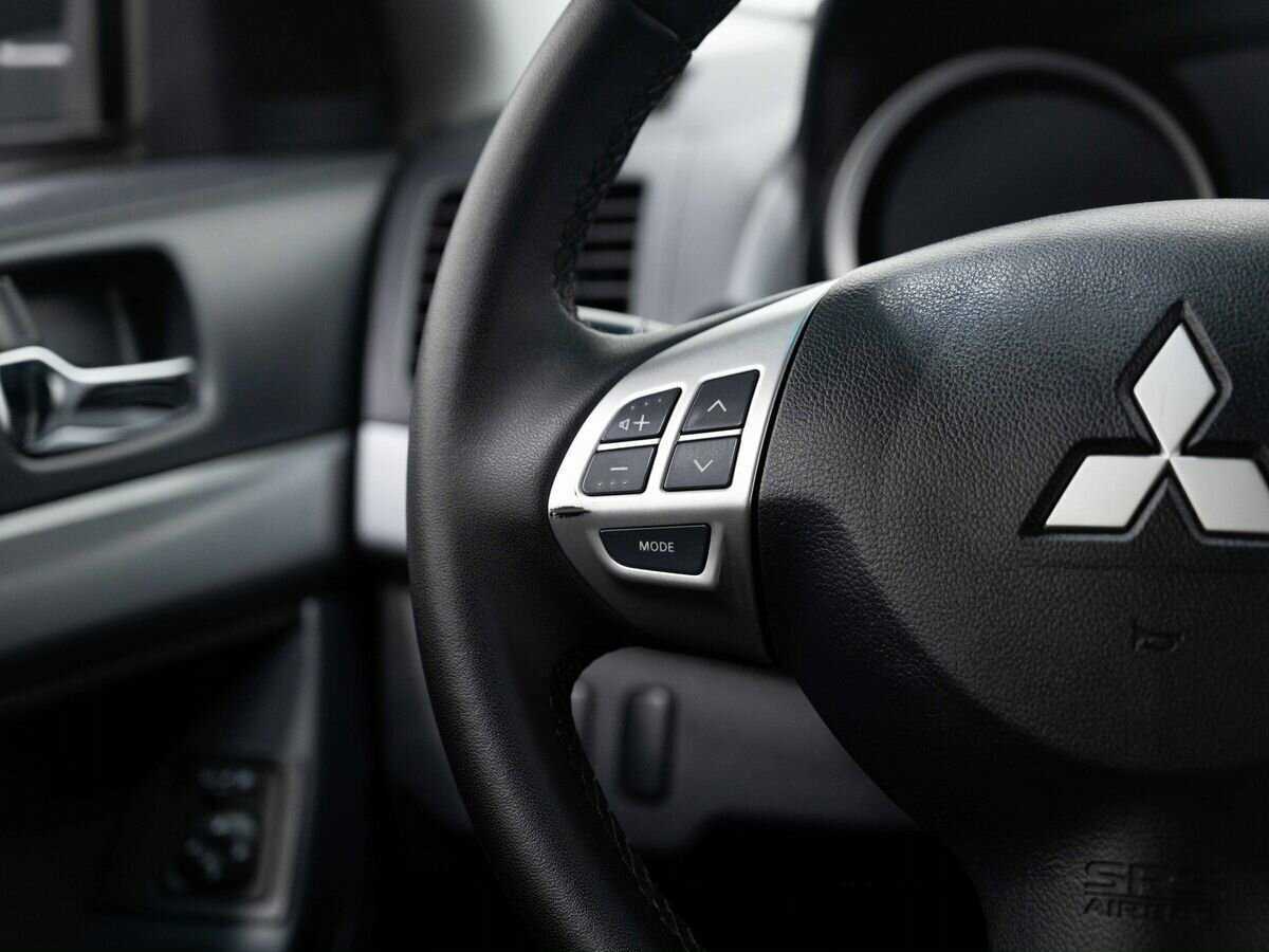 Mitsubishi Lancer с пробегом — 2011 год. Фото: #14