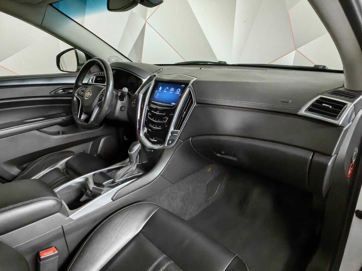 Cadillac SRX с пробегом — 2014 год. Фото: #8