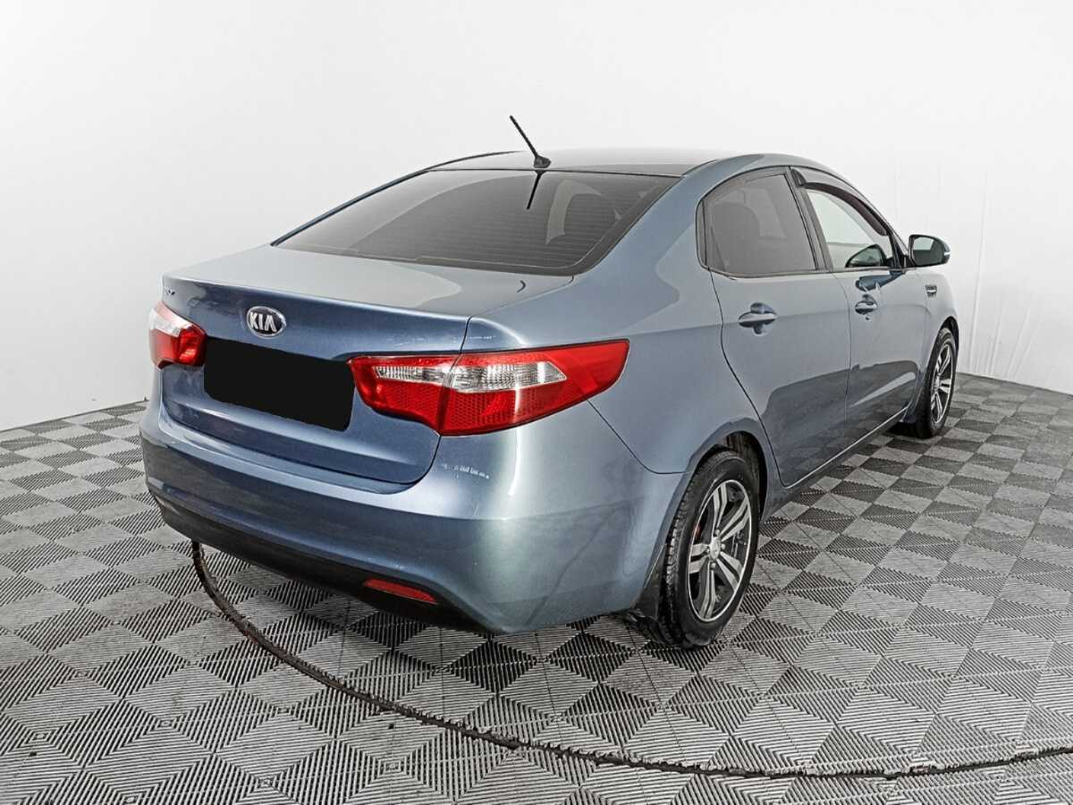 Kia Rio с пробегом — 2013 год. Фото: #3