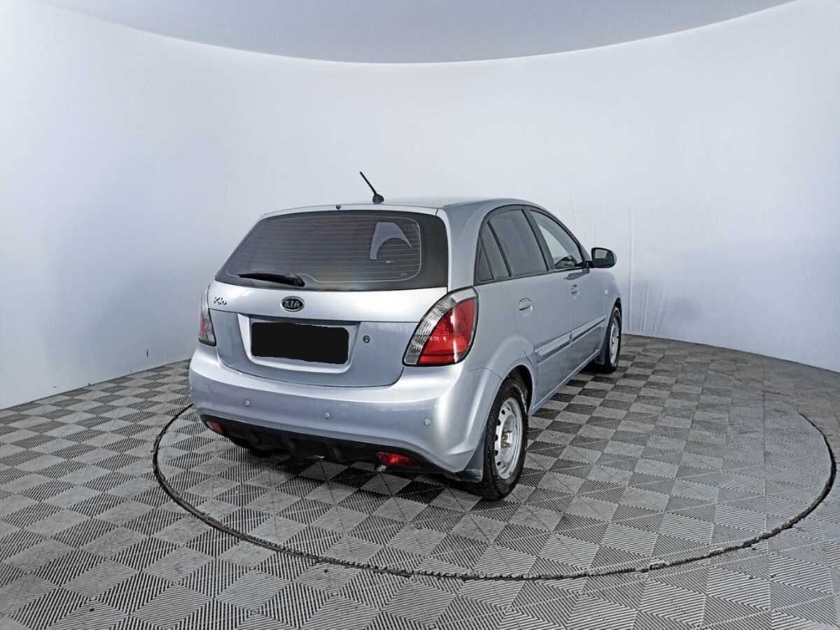Kia Rio с пробегом — 2010 год. Фото: #4