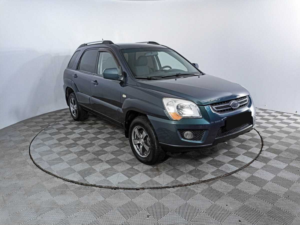 Kia Sportage с пробегом — 2009 год. Фото: #2