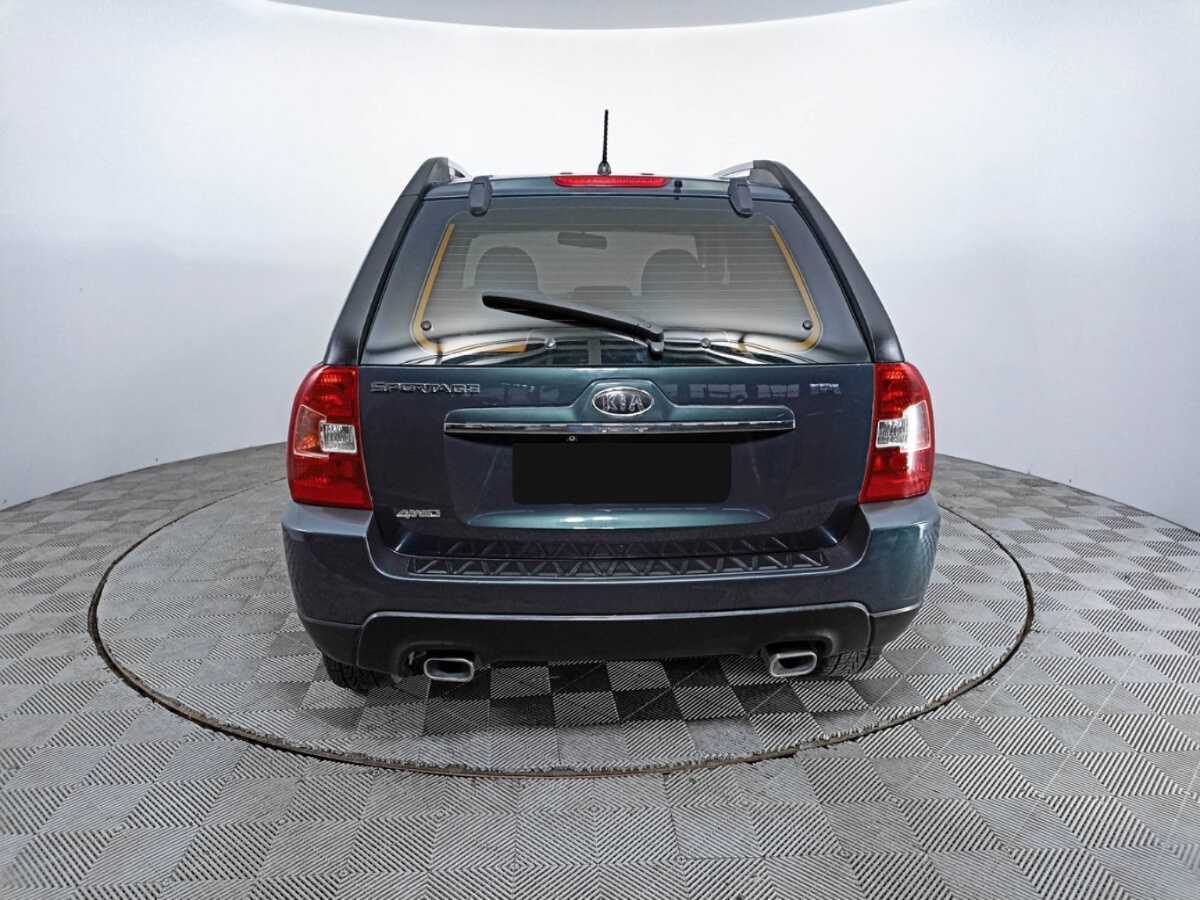 Kia Sportage с пробегом — 2009 год. Фото: #5