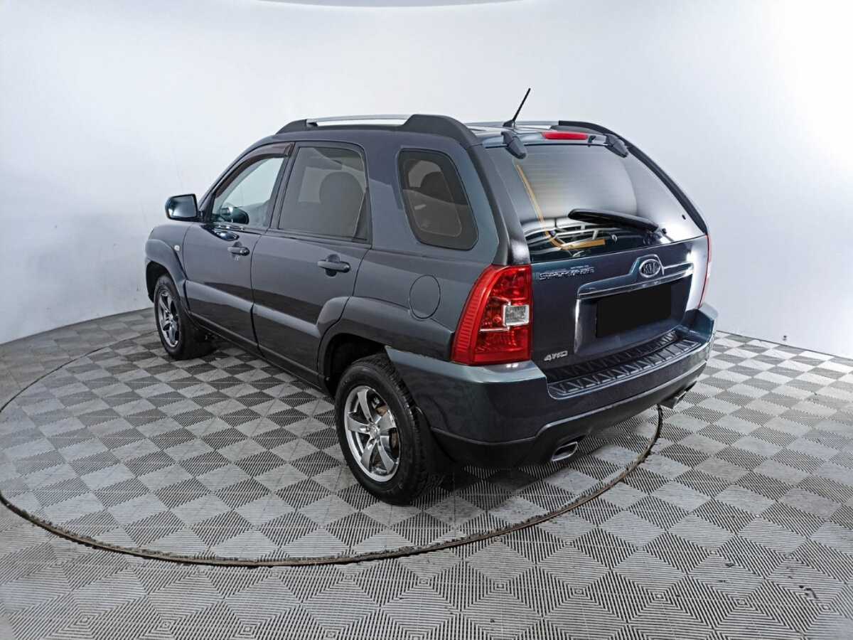 Kia Sportage с пробегом — 2009 год. Фото: #6