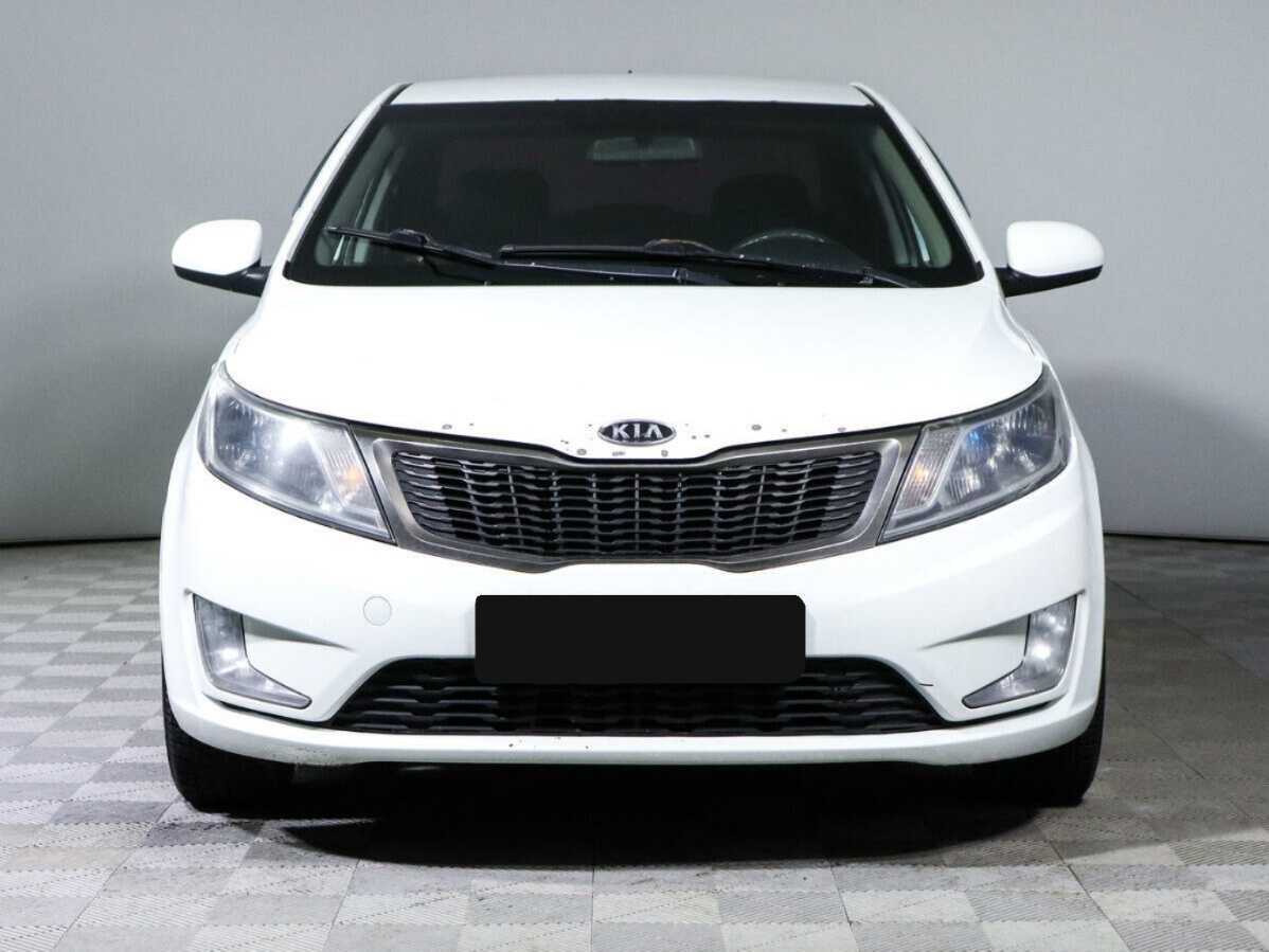 Kia Rio с пробегом — 2011 год. Фото: #1