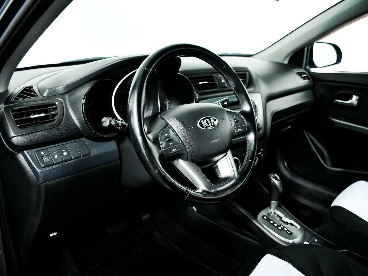 Kia Rio с пробегом — 2014 год. Фото: #12