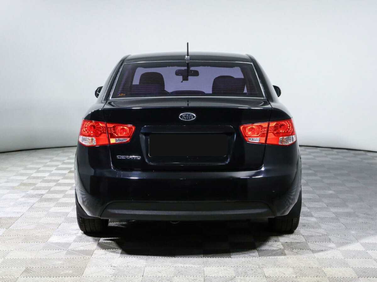 Kia Cerato с пробегом — 2011 год. Фото: #5