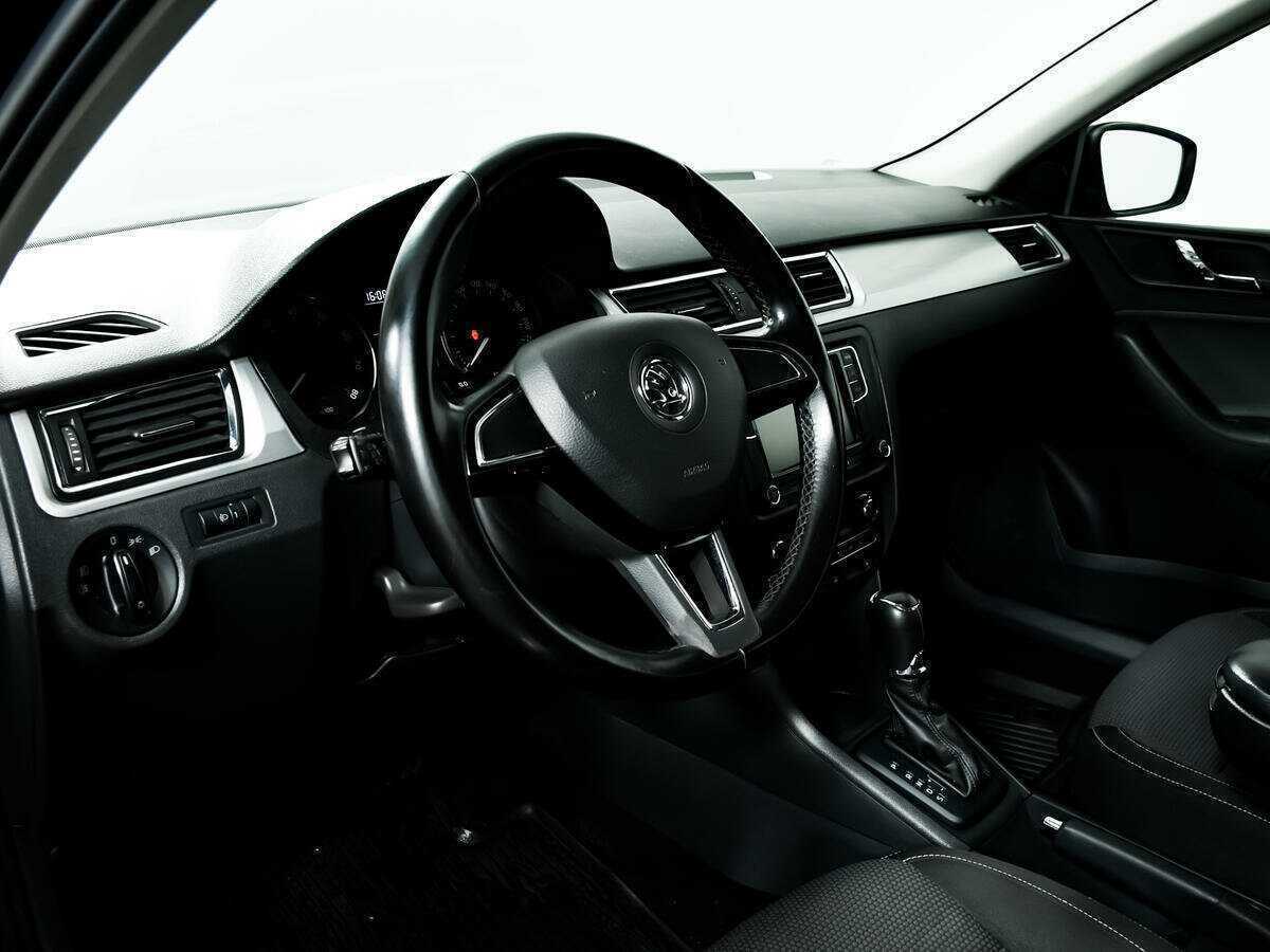 Skoda Rapid с пробегом — 2014 год. Фото: #12