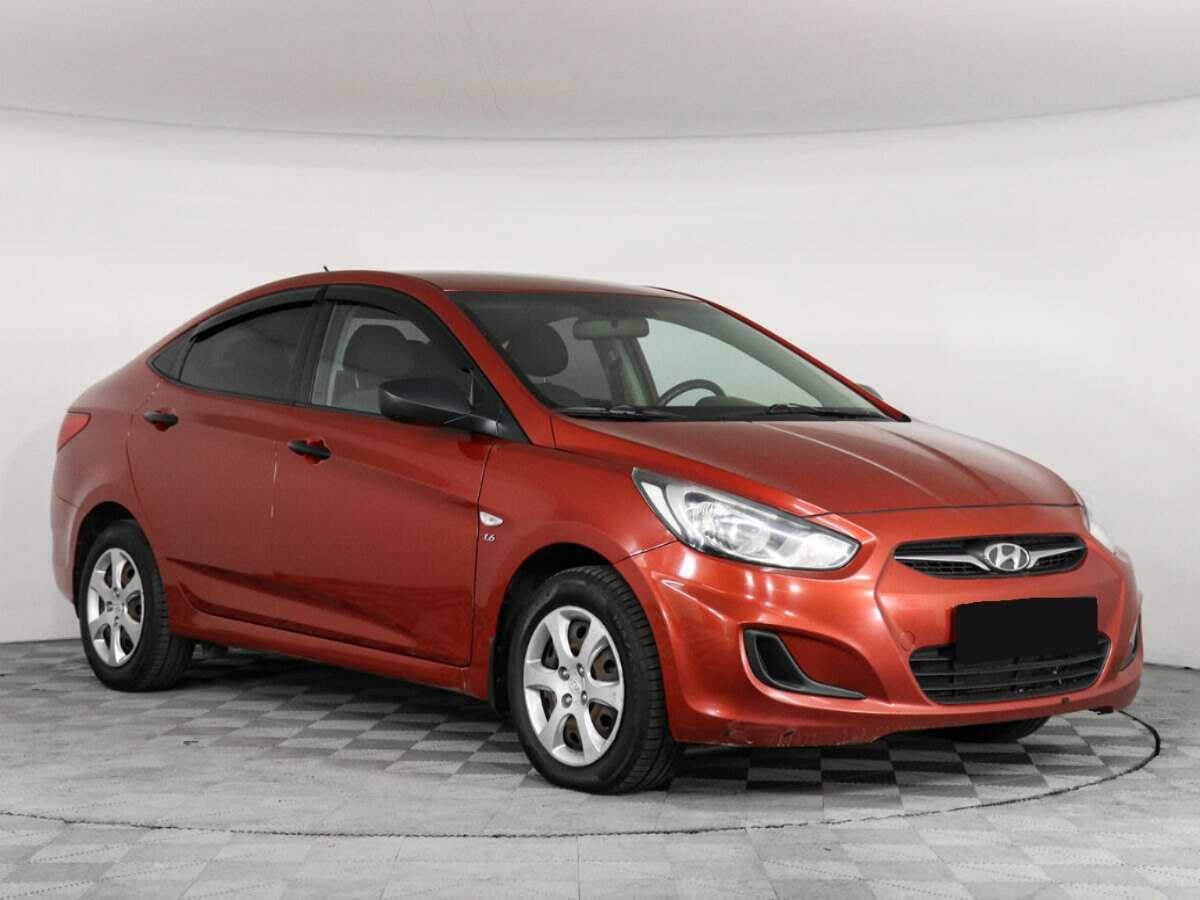 Hyundai Solaris с пробегом — 2013 год. Фото: #1