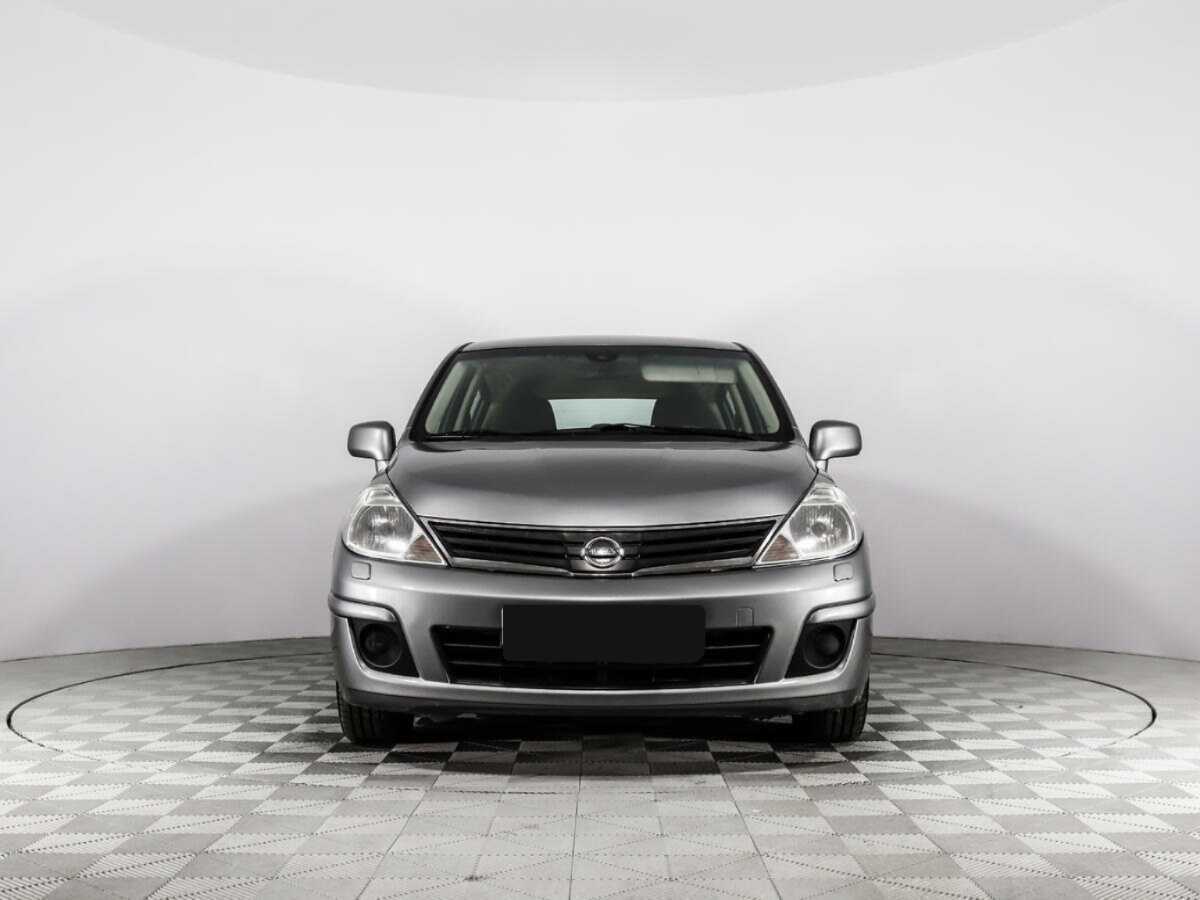 Nissan Tiida с пробегом — 2010 год. Фото: #1