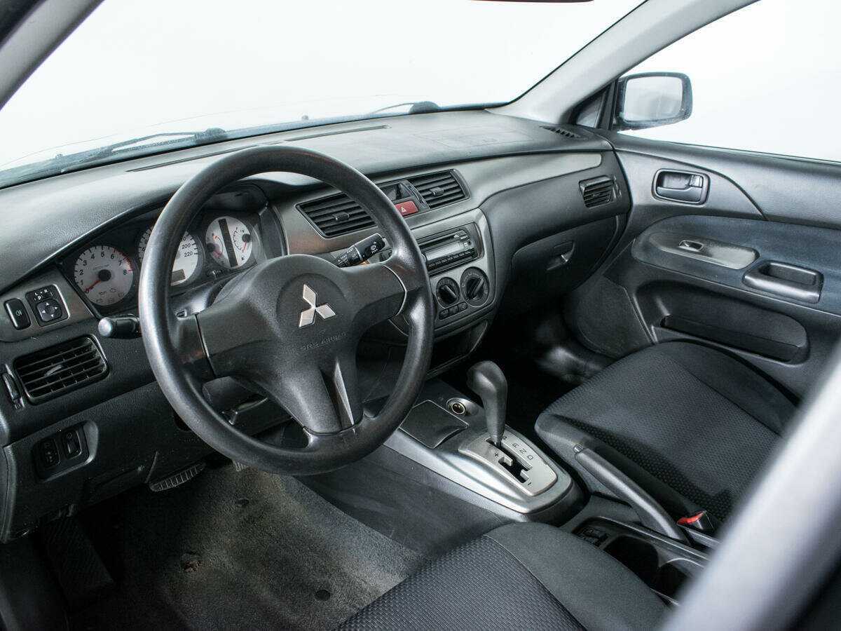 Mitsubishi Lancer с пробегом — 2009 год. Фото: #12