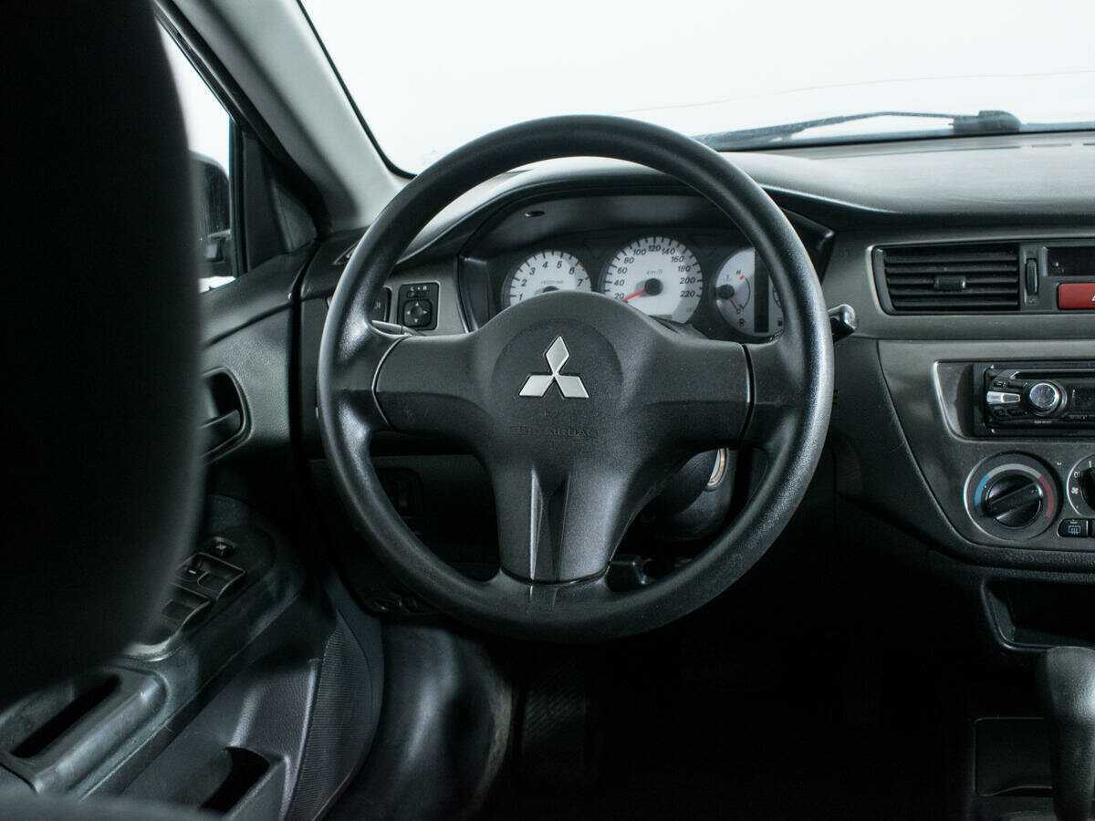 Mitsubishi Lancer с пробегом — 2009 год. Фото: #13