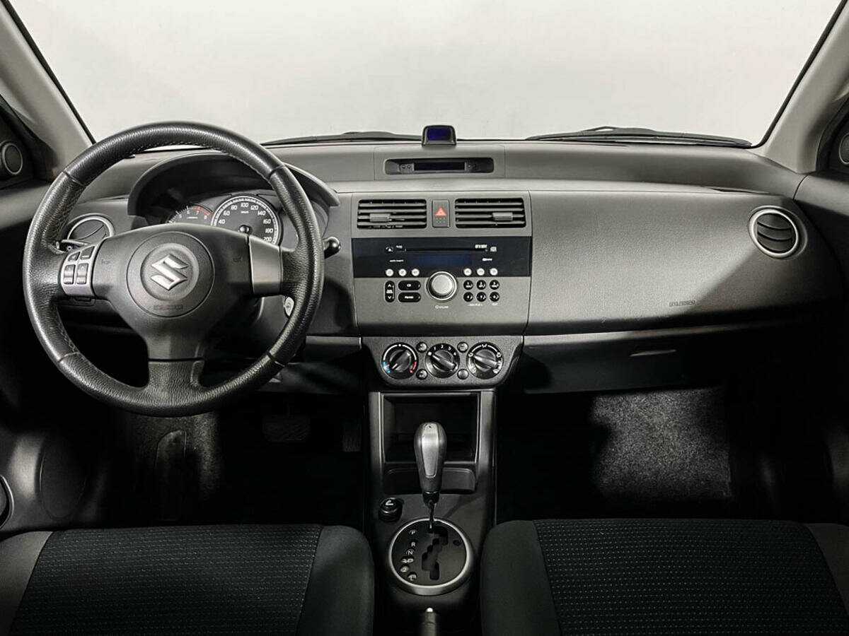 Suzuki Swift с пробегом — 2009 год. Фото: #11