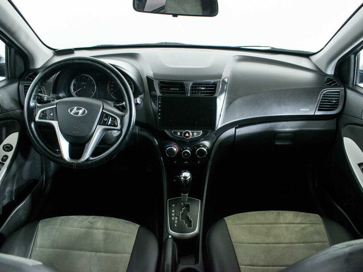 Hyundai Solaris с пробегом — 2014 год. Фото: #11