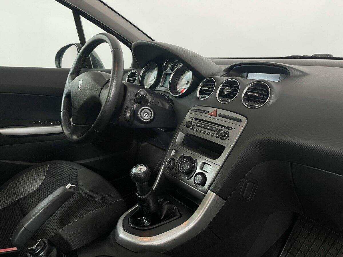 Peugeot 308 с пробегом — 2009 год. Фото: #8