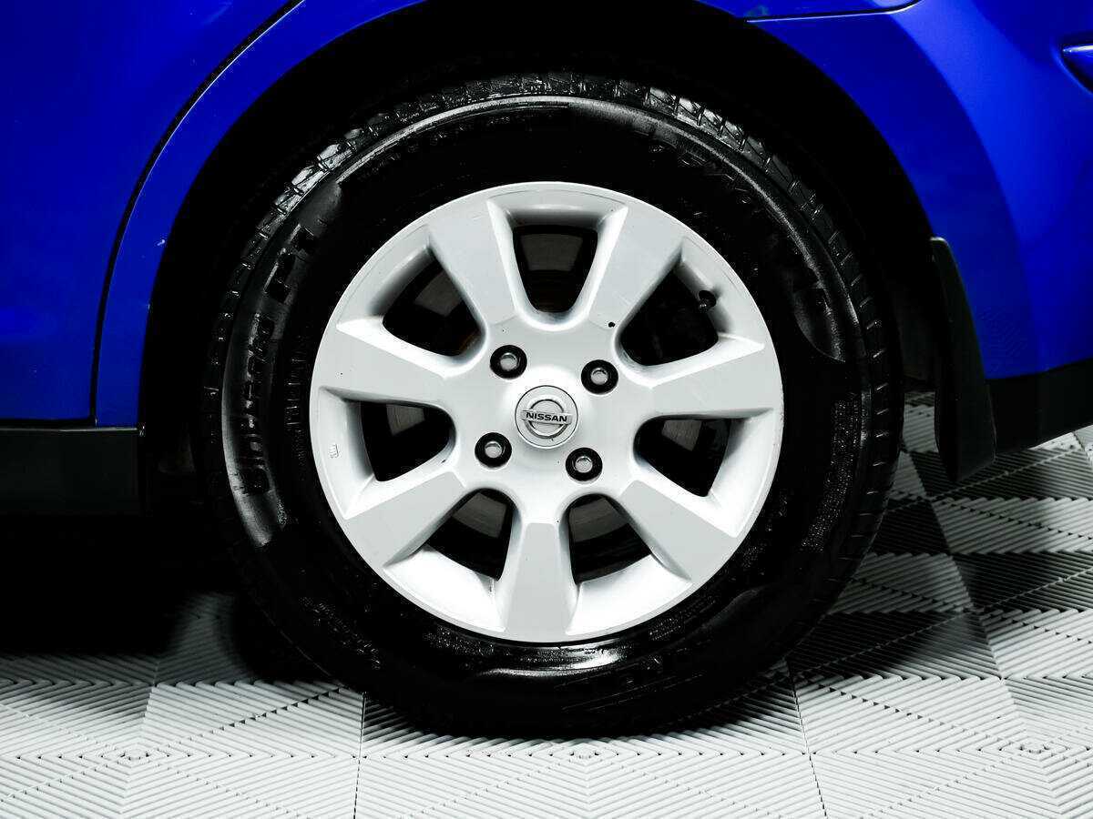 Nissan Tiida с пробегом — 2007 год. Фото: #13