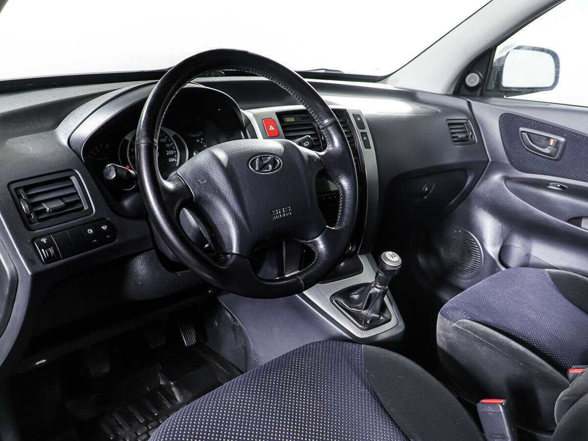 Hyundai Tucson с пробегом — 2008 год. Фото: #14
