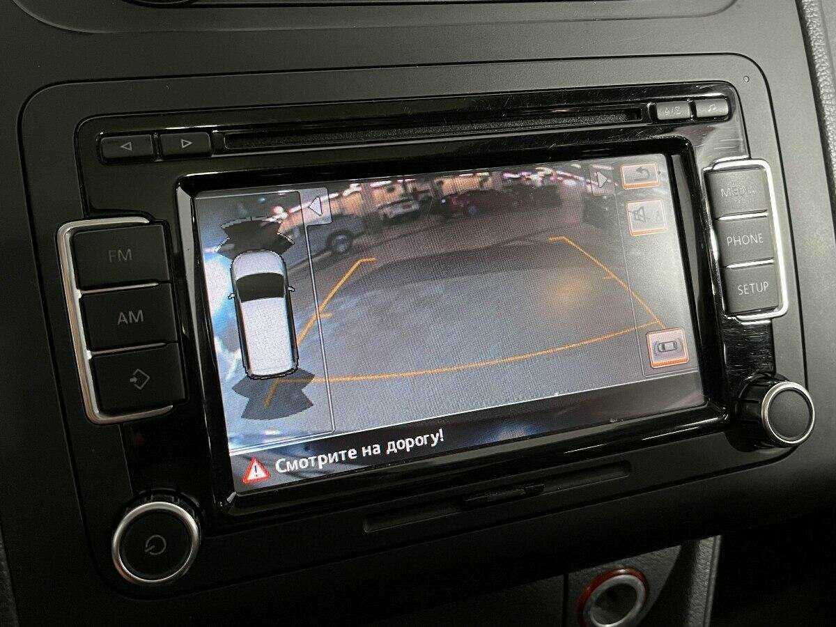 Volkswagen Touran с пробегом — 2012 год. Фото: #13