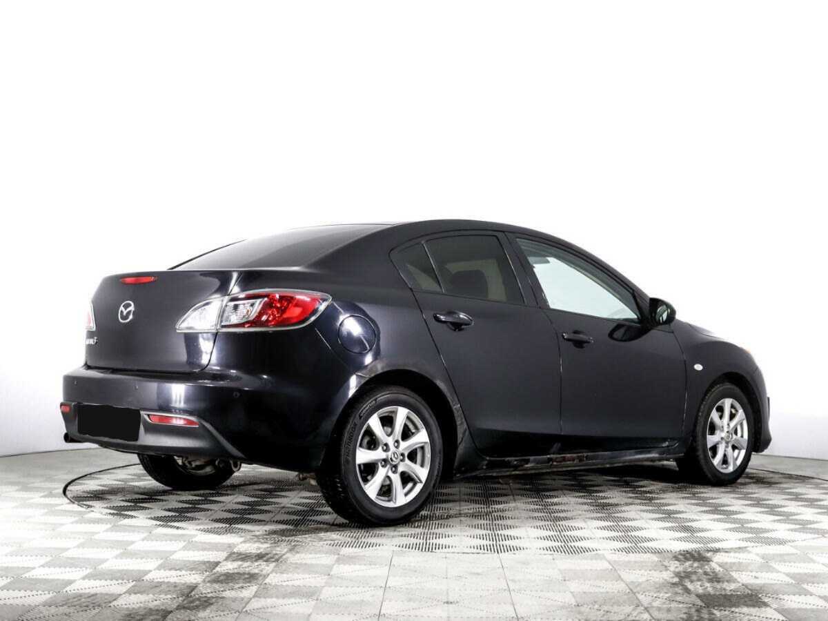 Mazda 3 с пробегом — 2010 год. Фото: #7