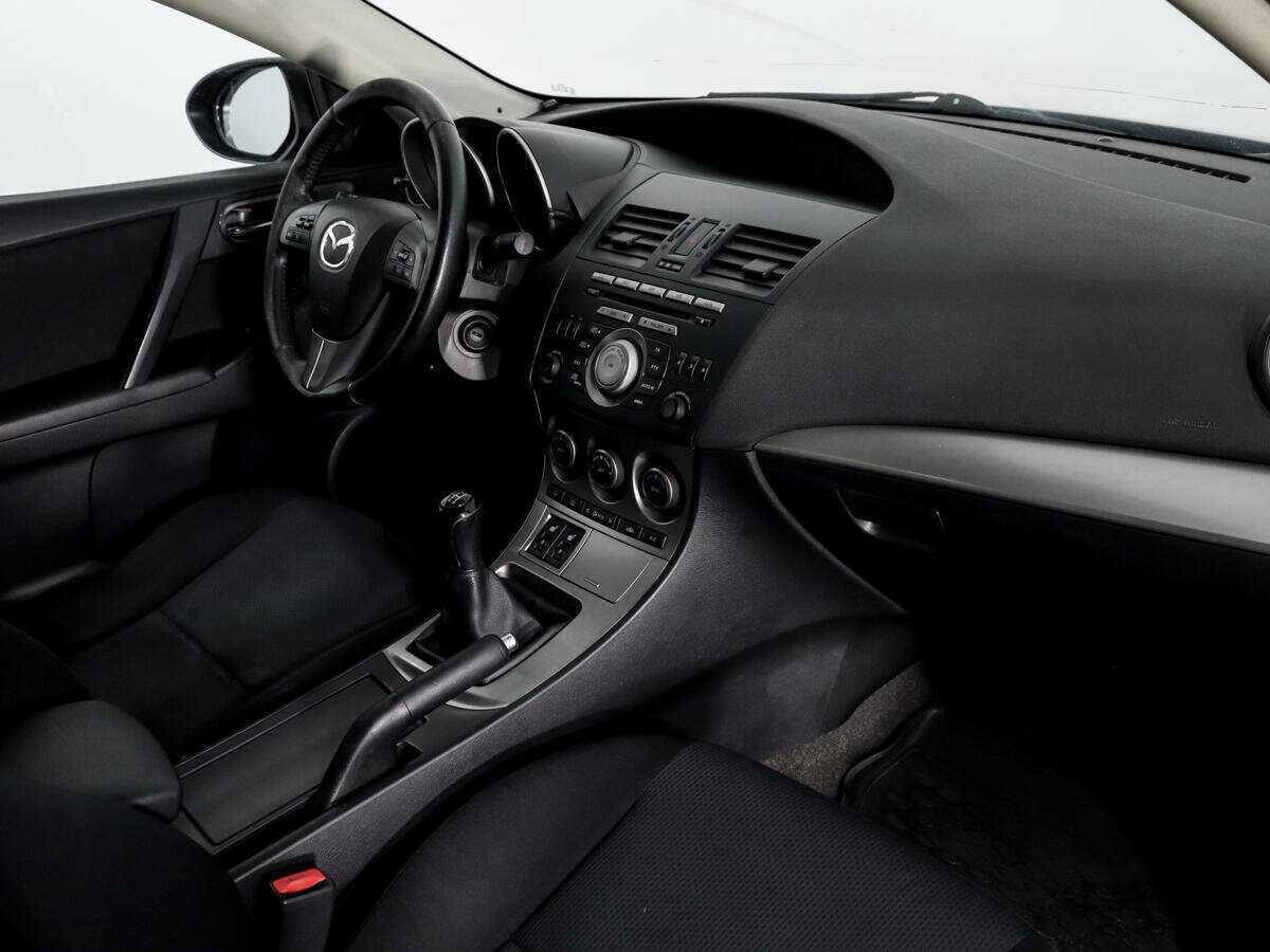Mazda 3 с пробегом — 2010 год. Фото: #9