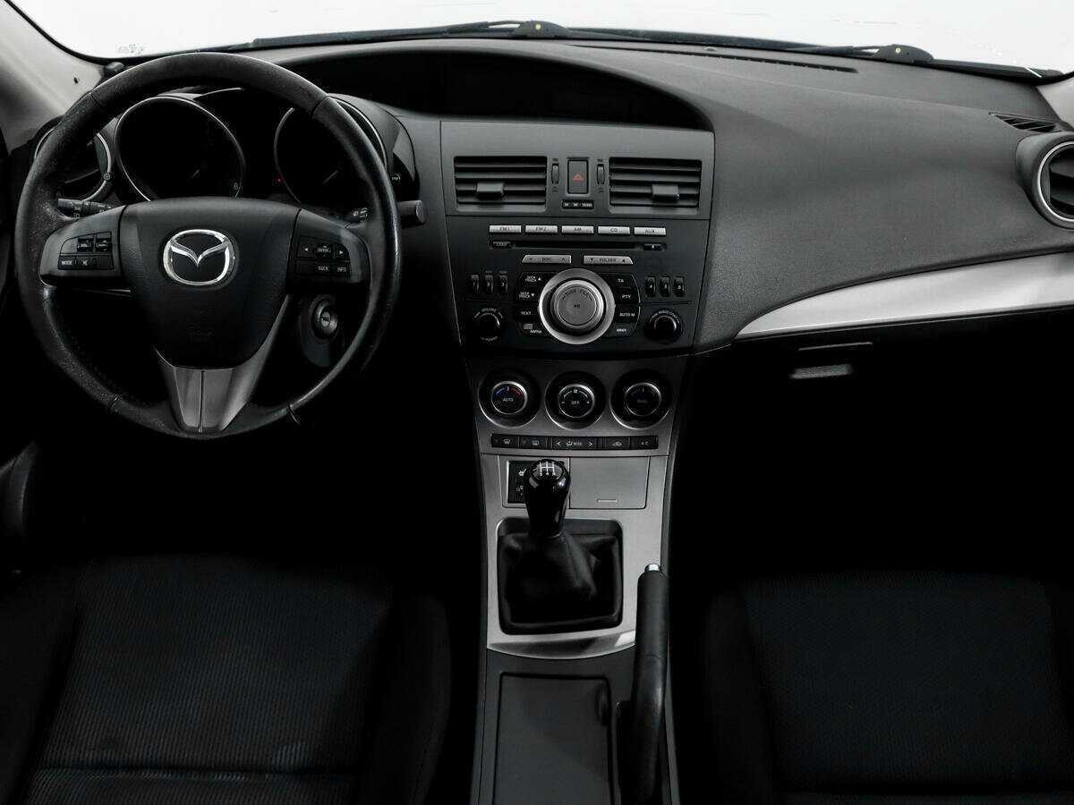 Mazda 3 с пробегом — 2010 год. Фото: #10