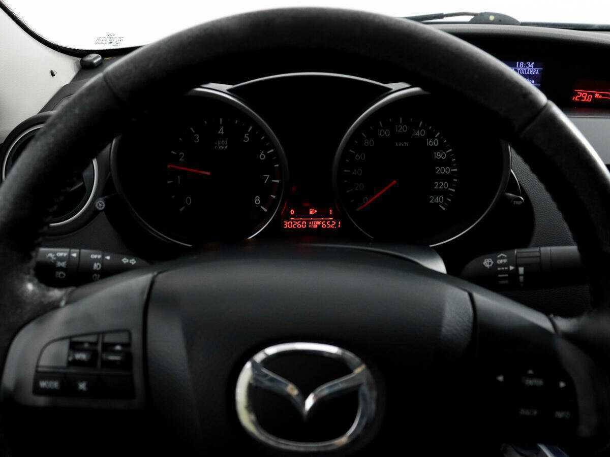 Mazda 3 с пробегом — 2010 год. Фото: #14