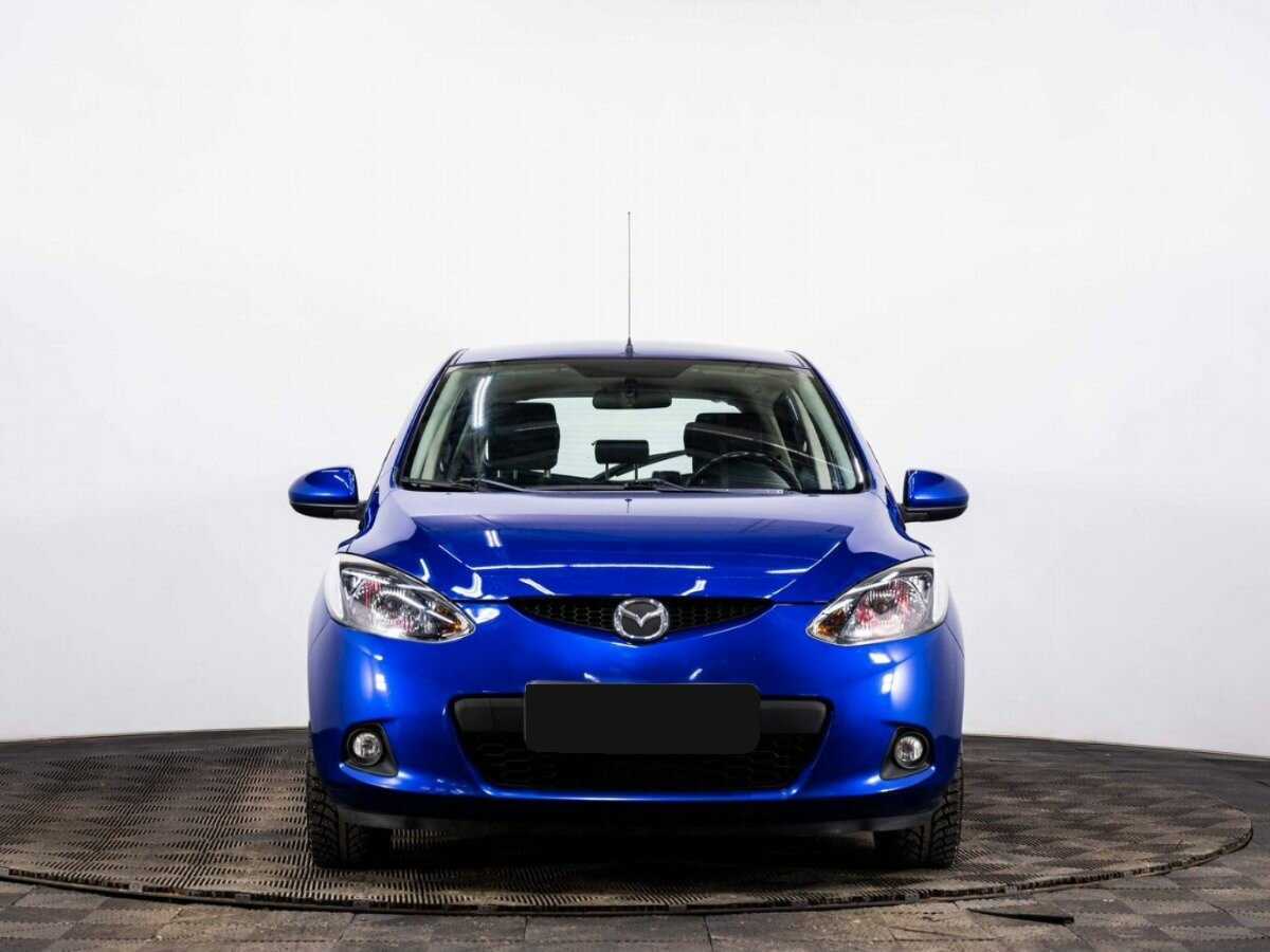 Mazda 2 с пробегом — 2009 год. Фото: #1