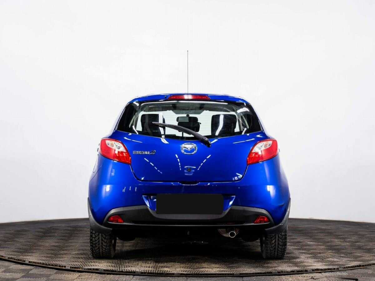 Mazda 2 с пробегом — 2009 год. Фото: #4