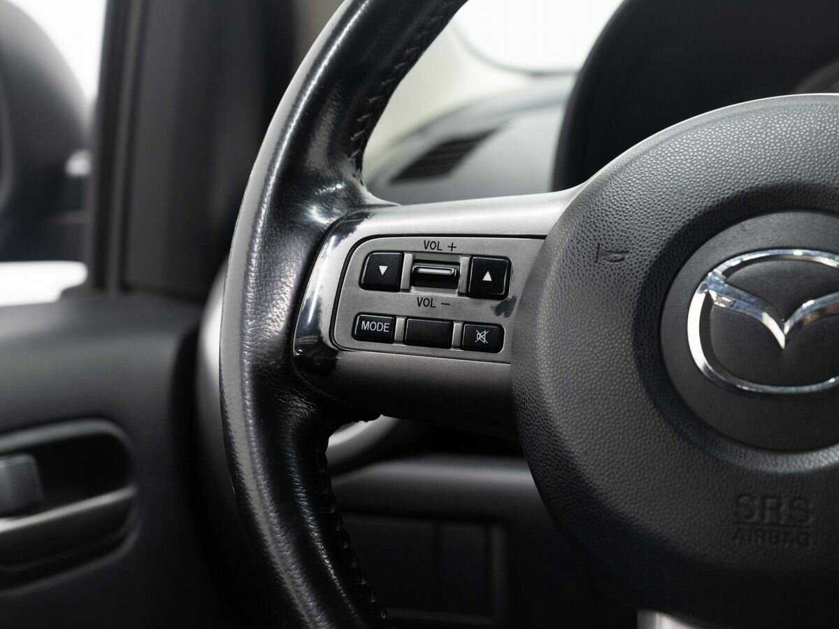 Mazda 2 с пробегом — 2009 год. Фото: #16