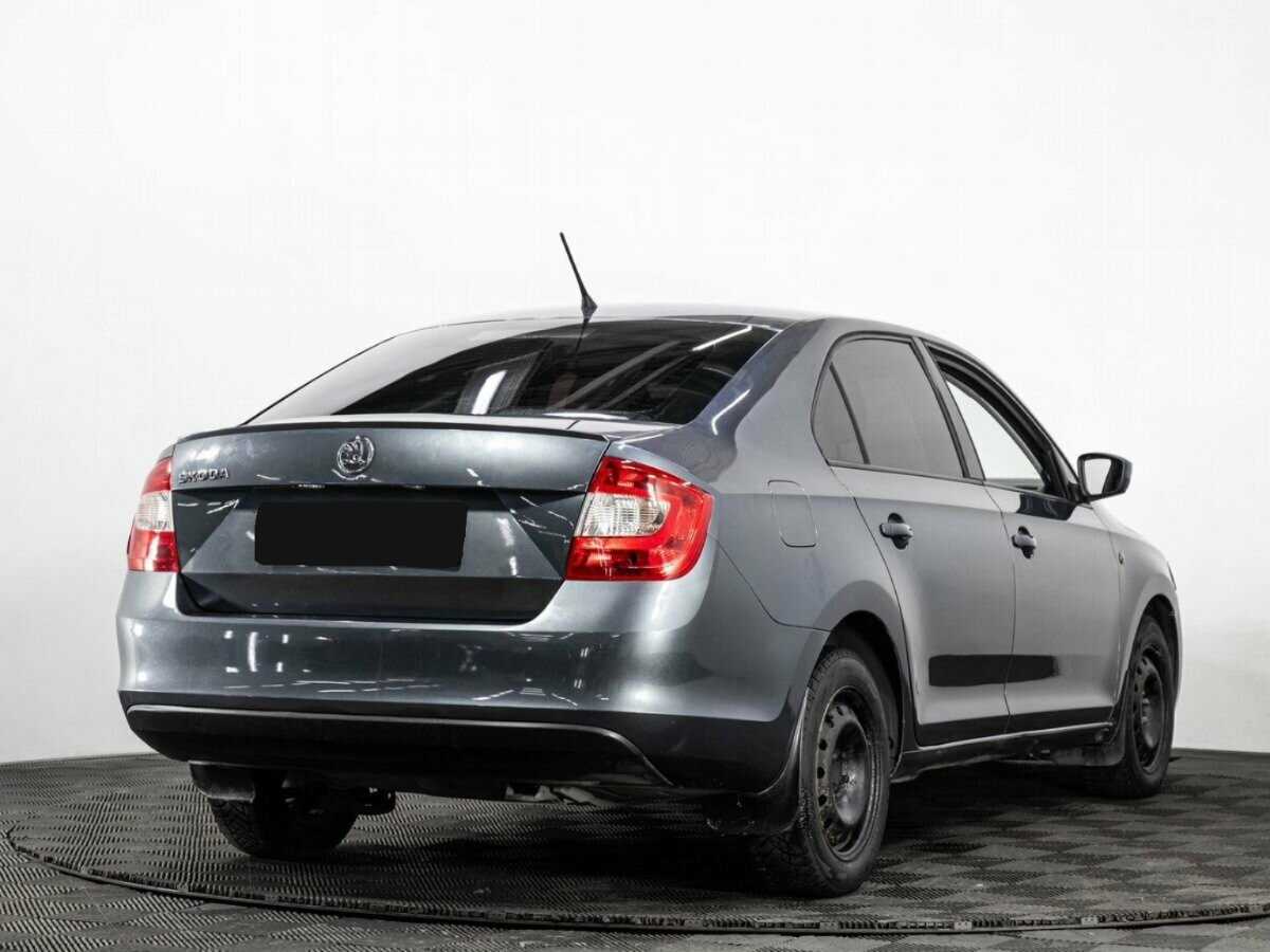Skoda Rapid с пробегом — 2014 год. Фото: #3