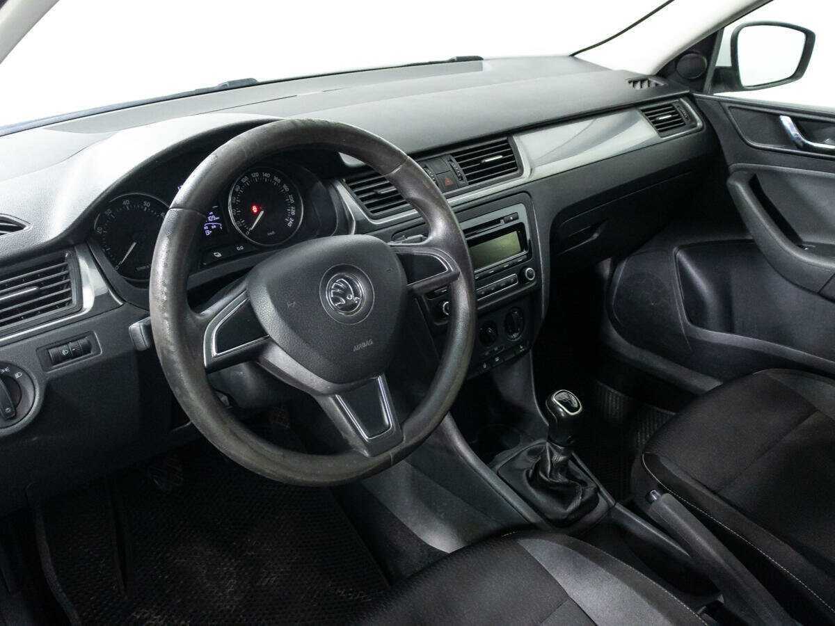 Skoda Rapid с пробегом — 2014 год. Фото: #10
