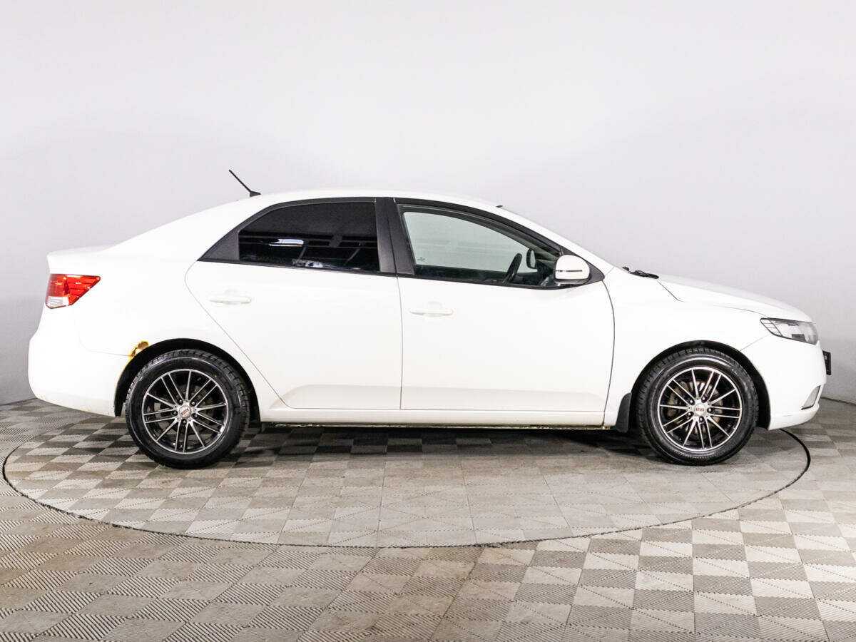 Kia Cerato с пробегом — 2012 год. Фото: #3