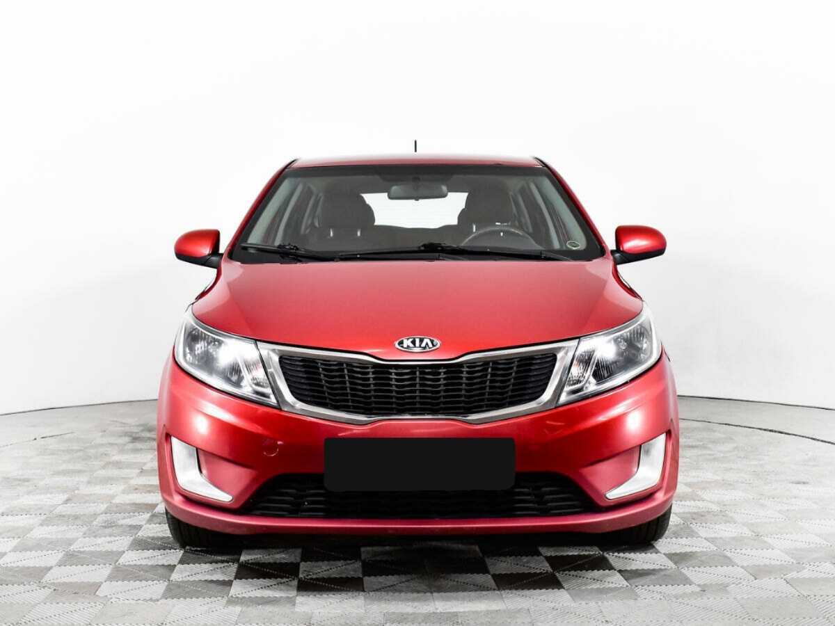 Kia Rio с пробегом — 2013 год. Фото: #1