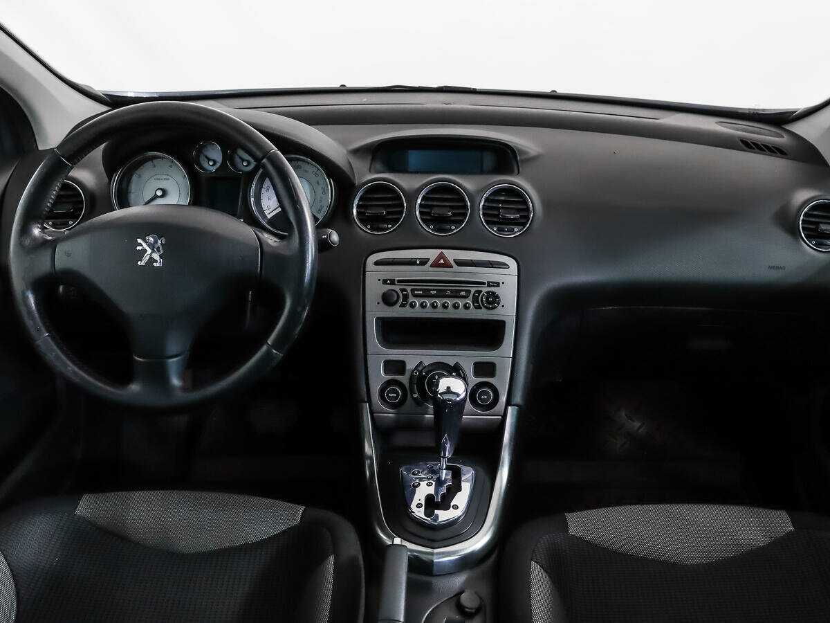 Peugeot 308 с пробегом — 2010 год. Фото: #11