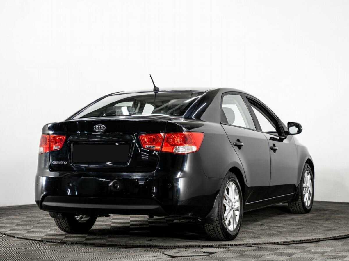 Kia Cerato с пробегом — 2011 год. Фото: #3