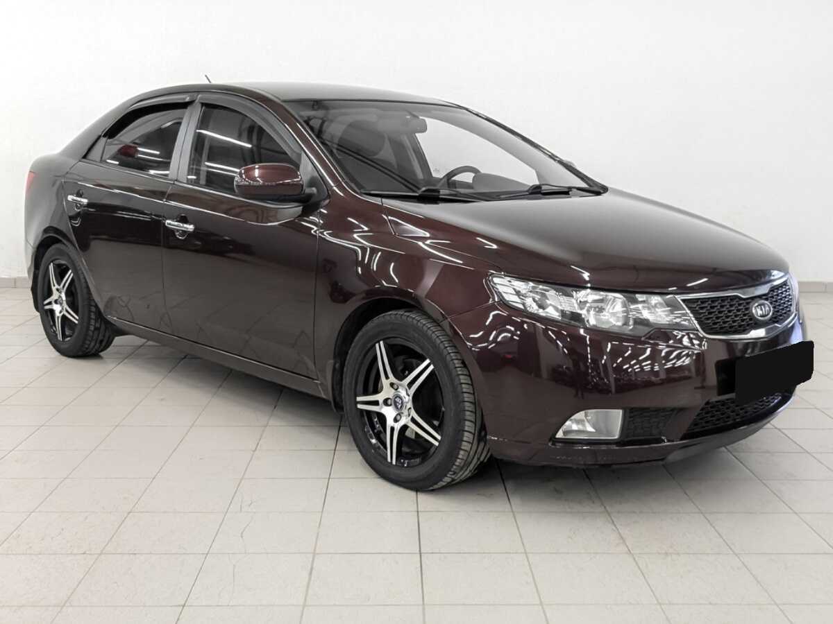 Kia Cerato с пробегом — 2011 год. Фото: #2