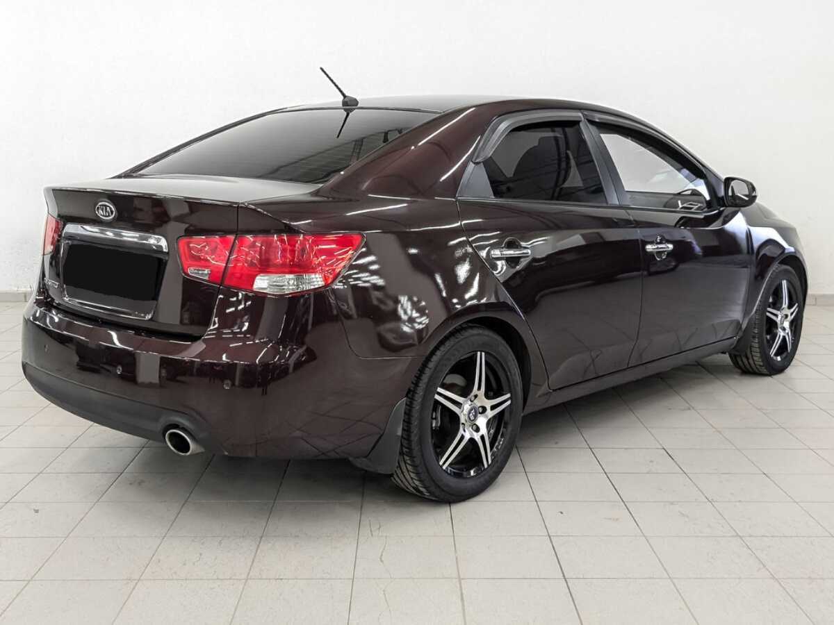 Kia Cerato с пробегом — 2011 год. Фото: #4