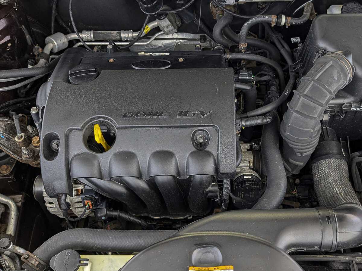 Kia Cerato с пробегом — 2011 год. Фото: #8