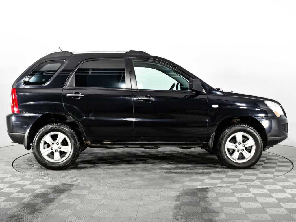 Kia Sportage с пробегом — 2010 год. Фото: #3